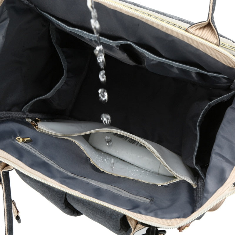 Introducing the "Charge 'n Carry" USB Diaper Bag: Stay Organized and Connected on-the-Go