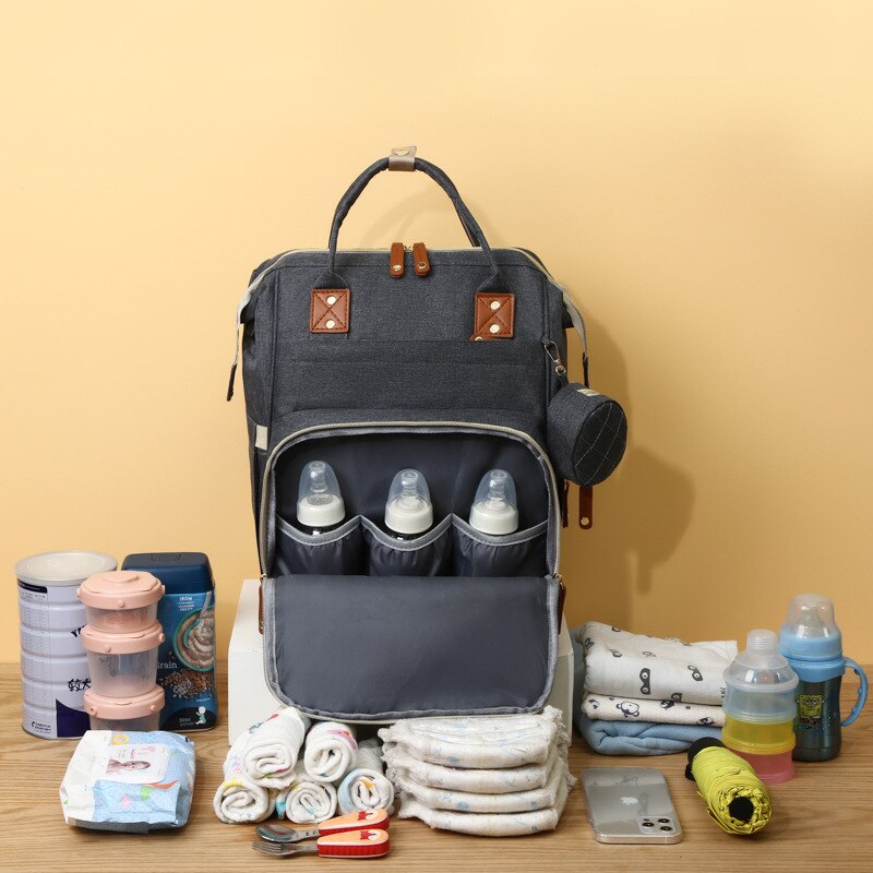 Introducing the "Charge 'n Carry" USB Diaper Bag: Stay Organized and Connected on-the-Go